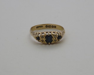 An 18ct gold dress ring set sapphires