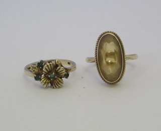 A 9ct gold dress ring set an oval cut brown stone and 1 other  dress ring