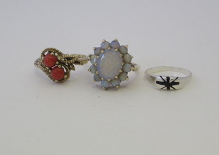 A gold dress ring set coral, a gold dress ring set "opals" and a  small silver dress ring