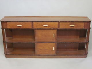 An Art Deco oak D shaped sideboard fitted 3 drawers, the base fitted 2 shelves with cupboard 75"