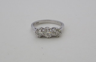 A lady's 18ct white gold dress/engagement ring set 3 diamonds,  approx 1.51ct