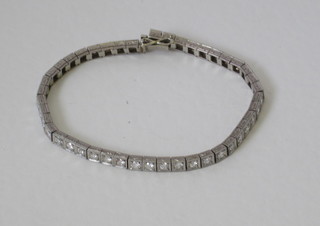 A lady's bracelet set numerous diamonds