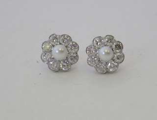 A pair of pearl and diamond cluster ear studs, approx 1.40ct