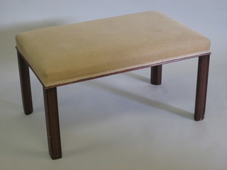 A rectangular Georgian style mahogany stool, raised on square tapering supports 30"