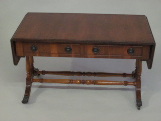 A Georgian style yew miniature sofa table, fitted 2 drawers 36"