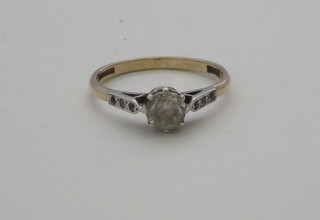 A lady's gold dress/engagement ring set a solitaire diamond