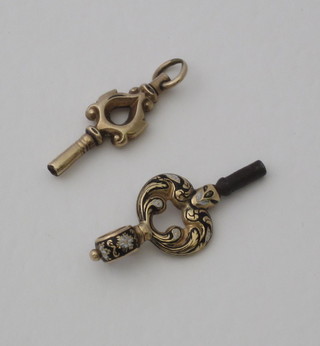 2 gilt metal watch keys
