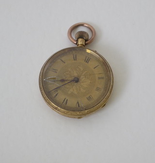 An open faced fob watch contained in an 18ct gold case