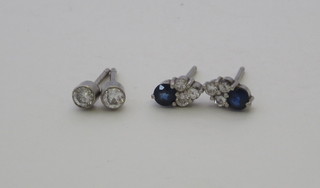 A pair of diamond ear studs, together with 1 other pair