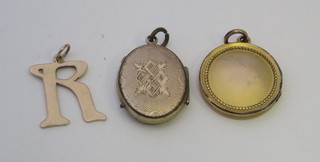 A 9ct gold pendant in the form of a capital R, together with 2 gilt metal lockets