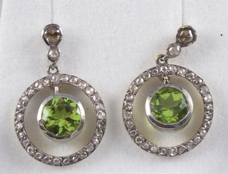 A pair of Peridot and diamond drop earrings