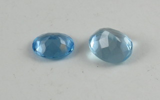 2 oval cut blue topaz, approx. 11cts