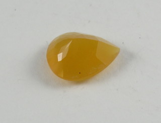 An orange pear shaped fire opal, approx 7.36ct