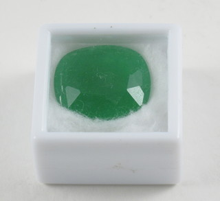 A cushion cut green jade gem stone, approx 17cts