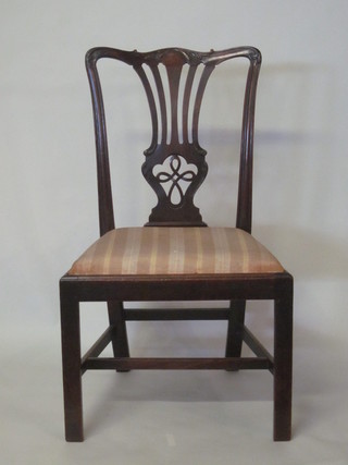 A 19th Century mahogany Chippendale style dining chair with  vase shaped slat back and upholstered drop in seat, raised on  square tapering supports