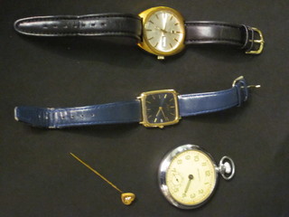 A Tissot wristwatch, 1 other wristwatch, a pocket watch and a  gold stick pin