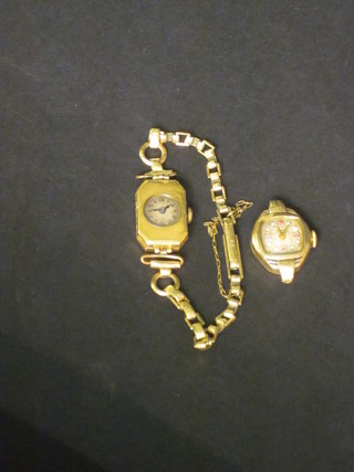 A lady's wristwatch contained in a 14ct gold case and 1 other