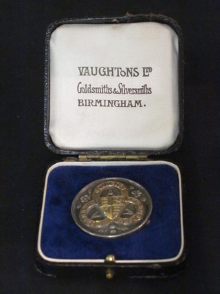 A silver Amateur Athletics Assoc. medal