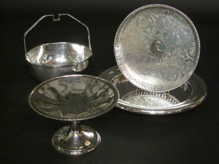 A circular silver plated platter, a circular silver plated galleried salver, a basket and a pedestal bowl