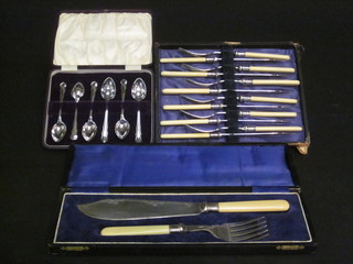 A set of 6 silver plated fish knives and forks, a set of 6 silver  plated teaspoons and a pair of silver plated fish servers cased
