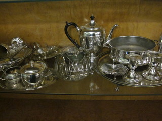 A collection of silver plated flatware