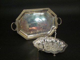 A silver plated lozenge shaped twin handled tea tray and an  embossed silver plated cake basket with swing handle