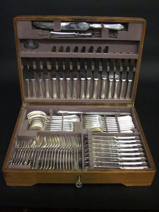 A canteen of silver plated flatware by Mappin & Webb contained in an oak canteen box