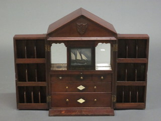 A Georgian apothecaries cabinet in the form of a town house  fitted drawers and pigeon holes 12"  ILLUSTRATED