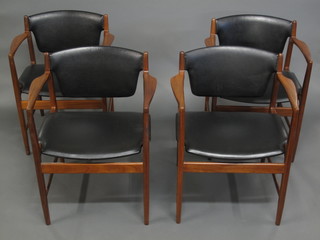 A set of 4 teak G Plan Danish design open arm chairs by Kofod-Larsen with gold stamp  ILLUSTRATED