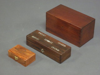 A Victorian rectangular rosewood box, the hinged lid inlaid  mother of pearl 10", a rosewood caddy box, no interior and a  small hardwood trinket box with hinged lid
