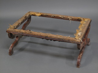 A Victorian rectangular mahogany stool on X framed supports  with turned stretcher, the base with label marked Lord Fisher,  Kilverstone Hall, 32 1/2" long, requires upholstery,