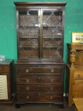 A 19th Century mahogany secretaire bookcase, the upper section  with moulded and dentil cornice, fitted adjustable shelves  enclosed by astragal glazed panelled doors, with well fitted  secretaire drawer above 3 long drawers, raised on bracket feet  43"