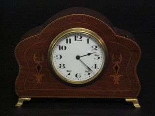 An Edwardian bedroom timepiece with enamelled dial and Arabic numerals contained in an inlaid mahogany case
