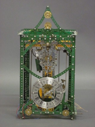 A A green and yellow Meccano clock 12"