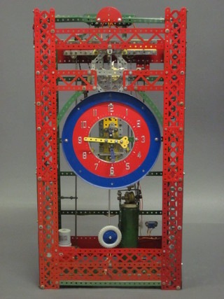 A red and blue Meccano electric clock 15"