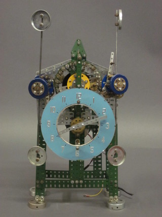 A green Meccano clock