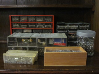 A collection of Meccano nuts and bolts etc