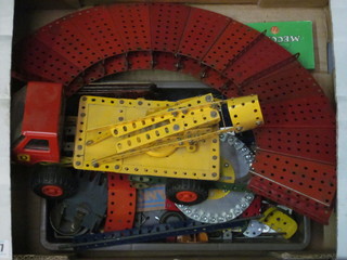 A yellow and red Meccano model crane etc