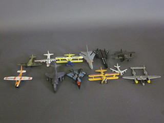 A collection of various wooden model aircraft
