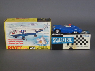 A Triang Scalextric model racing car boxed and a Dinky no.724 battery powered Sea King helicopter