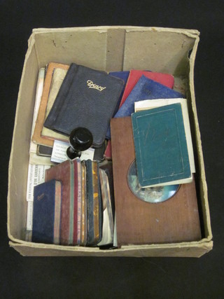 A coloured magic lantern slide and a collection of various diaries  etc