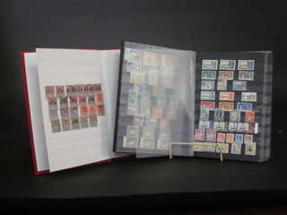 2 red stock books of various stamps