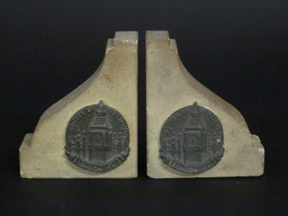 A pair of stone bookends made from sections of the Houses of Parliament
