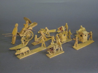 A collection of Eastern carved wooden figures