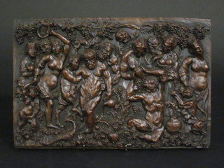 A resin wall plaque decorated Bacchanalian scenes