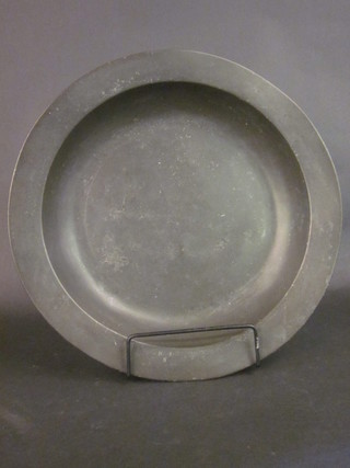 An 18th Century circular pewter dish with London touch mark  15"