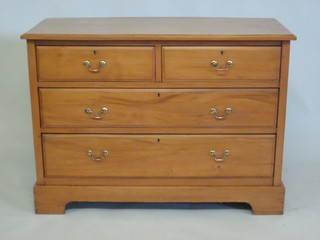 A Victorian satinwood chest of 2 short and 2 long drawers with  brass swan neck drop handles, raised on bracket feet 42"