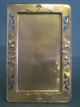 An Art Nouveau rectangular pierced and embossed copper tray 18"
