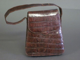 A ladies "crocodile skin" handbag