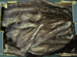 A lady's mink stole, 1 other stole and a short fur jacket